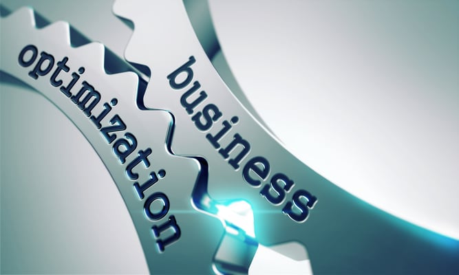 Business Optimization on Gears Mechanism on a Gray Background.